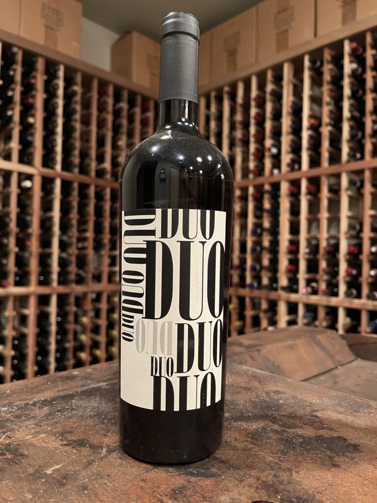 Bottle of Duo in a wine cellar